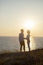 Silhouette photography of couples younger man and woman standing