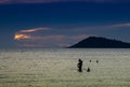 Silhouette Photography of ourist playing in the sea at Praw bay, Samed Island, Thailand during dusk beautiful sky