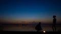 silhouette photos of people on Lake Senezh