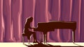 Silhouette pianist in concert hall in spotlight.