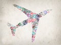 Silhouette of a plane created with passport stamps