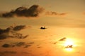 Silhouette plane at sunset Sunset in Maron Beach, Semarang, Indonesia