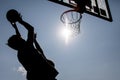 Silhouette play basketball young boys