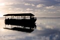 Silhouette of Polynesian boat mooring on Muri lagoon Muri lagoon