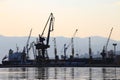 Silhouette of port cranes and ships, harbor of Rijeka, Croatia Royalty Free Stock Photo