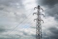 Silhouette of a power cable tower on cloudy day Royalty Free Stock Photo