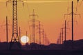 Silhouette of a power line during sunset, the sun and electric metal supports extending into the distance beyond the horizon Royalty Free Stock Photo