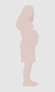 Silhouette of a pregnant girl in full growth. A woman in expectation of a child stands in profile