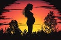 Silhouette of a pregnant woman against the background of the sunset. Royalty Free Stock Photo