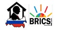 Silhouette of the President of Russia Vladimir Putin in the house on the map of Russia and the logo of the BRICS summit 2023 Royalty Free Stock Photo