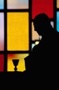 Silhouette of priest