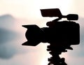 Silhouette of a professional studio video camera. Preparation and release of news Royalty Free Stock Photo