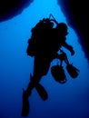 Silhouette of professional underwater photographer Royalty Free Stock Photo