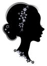 Silhouette profile of a cute lady s head. The girl has long beautiful hair, decorated with purple flowers. Suitable for Royalty Free Stock Photo