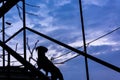 a silhouette of a puppy standing on a staircase in blue hours