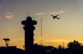 silhouette radar tower on Sunset sky. Royalty Free Stock Photo