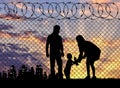 Silhouette of refugee families