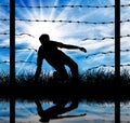 Silhouette of a refugee who illegally cross the border