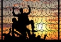 Silhouette of refugees crossing the border illegally