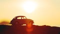 Silhouette of retro car on sunset Royalty Free Stock Photo