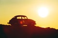 Silhouette of retro car on sunset Royalty Free Stock Photo