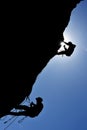 Silhouette of a rock climber hanging on the wall Royalty Free Stock Photo