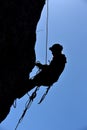 Silhouette of a rock climber hanging on the wall Royalty Free Stock Photo