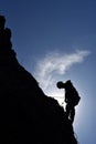 Silhouette of a rock climber hanging on the wall Royalty Free Stock Photo