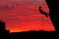 Rock Climber Rappelling Silhouette