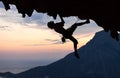 Silhouette of a rock climber at sunset Royalty Free Stock Photo