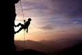 Silhouette of Rock Climber at Sunset