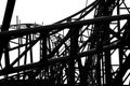Silhouette roller coaster tracks on a white bacground Royalty Free Stock Photo