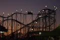 Silhouette of rollercoaster at sunset