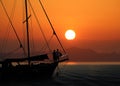 Silhouette romantic couple in love on sailboat