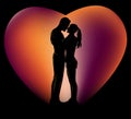 Silhouette of romantic couple on sunset colors heart shaped background