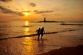 Silhouette romantic scene of couples on the beach