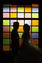 Silhouette romantic Scene of love couples on colorful wall