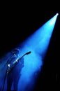 Silhouette of Romy Madley, singer and guitarist of The XX