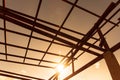 Silhouette Roof structure with steel on the concrete pillars and evening sky