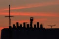 Silhouette of a rooftop during sunset Royalty Free Stock Photo