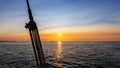 Pulley silhouette on a sailboat at sunset Royalty Free Stock Photo