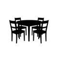 Silhouette of a round table accompanied by four chairs, all with a simple design. The Royalty Free Stock Photo