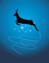 Silhouette of a running Christmas deer