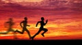 Silhouette of running man against the colorful sky.