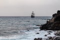 Santa Cruz - Silhouette of sailing boat ship on the majestic Atlantic Ocean seen from Praia Santa Cruz, Madeira island Royalty Free Stock Photo