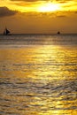 Silhouette of sailing boats on horizon of tropical sunset sea Philippines Royalty Free Stock Photo