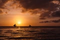 Silhouette of sailing boats over a beautiful sunset on Boracay Royalty Free Stock Photo