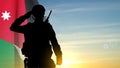 Silhouette of a saluting soldier with Jordan flag