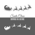 Silhouette Santa Claus driving in a sleigh and deers set isolated Royalty Free Stock Photo