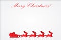 Silhouette of Santa Claus flying with the sleigh and his reindeer on Christmas background Royalty Free Stock Photo